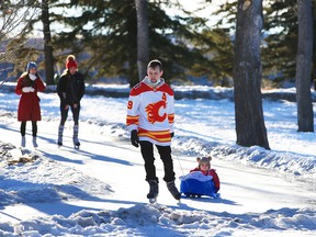 Calgarians enjoy the skate track in North Glenmore Park on a sunny afternoon, Thursday, Jan. 14, 2021.