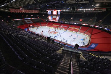 The Calgary Flames and Vancouver Canucks warm up in the empty Scotiabank Saddledome before the Calgary Flames NHL home opener on Saturday, January 16, 2021. 
Gavin Young/Postmedia