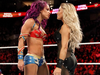 Sasha Banks and Trish Stratus go face to face at the Royal Rumble in 2018.