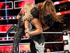 Beth Phoenix has Nia Jax over her shoulders ready for elimination!