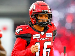 Royce Metchie of the Calgary Stampeders runs onto the field during player introductions before facing the Winnipeg Blue Bombers in CFL football on Saturday, October 19, 2019. Al Charest/Postmedia