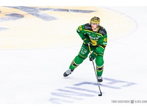 Calgary Flames prospect Juuso Valimaki wears the golden helmet -- a tradition in Finland's Liiga to signify the leading scorer on each team -- during game action on Oct. 20, 2020. The 22-year-old Valimaki is on loan to Tampereen Ilves until the NHL resumes for the 2020-21 campaign. (Timo Koistinen/Ilves.com)
