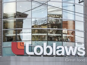 Loblaws company logo on a building in downtown Toronton.