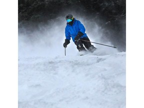 A skier enjoys the new snow at Lake Louise ski resort last weekend.
