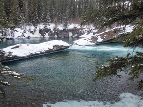 The Kananaskis River pops through a gap in a rock shelf at the Widowmaker on the way to Nakiska, Ab., on Tuesday, February 16, 2021.