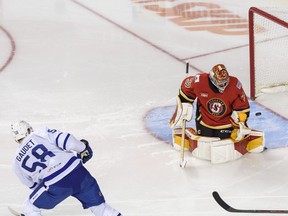 Toronto Marlies Tyler Gaudet scores a goal against Stockton Heat Goalie Dustin Wolf at Scotiabank Saddledome on Sunday, February 21, 2021. Azin Ghaffari/Postmedia