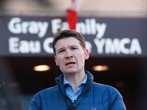 Calgary Ward 11 Councillor Jeromy Farkas speaks about his notice of motion calling on city council to enter talks with the YMCA to save the Eau Claire YMCA. Farkas spoke outside the Eau Claire YMCA on Wednesday, Feb. 24, 2021.