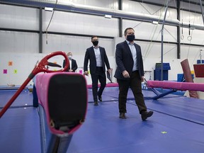 Premier Jason Kenney and Minister of Jobs, Economy and Innovation Doug Schweitzer at the North Edmonton Gymnastics Club on February 17, 2021.
