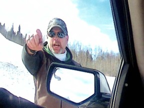 Rocky Mountain House RCMP are asking for the public's help in identifying this man, who allegedly pointed a gun at a county peace officer.