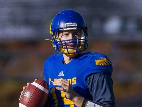 Former UBC Thunderbirds star QB Michael O'Connor signed with the CFL's Calgary Stampeders on Tuesday.