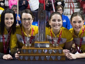Team Manitoba skip Kerri Einarson, third Val Sweeting, second Shannon Birchard and lead Briane Meilleur pose with the trophy after defeating Team Ontario to win the Scotties Tournament of Hearts in Moose Jaw, Sask., on Feb. 23, 2020.