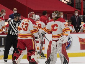 Flames goalie David Rittich is replaced by Artyom Zagidulin in the second period against the Ottawa Senators on Thursday, Feb. 25, 2021.