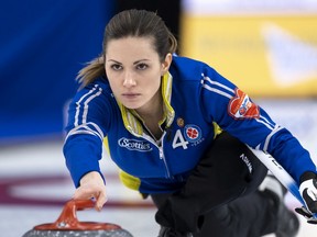 Team Alberta, skip Laura Walker throws in draw three of the Scotties Tournament of Hearts 2021 against Team Wild Card 2 skipped by Mackenzie Zacharias, the Canadian Women's Curling Championship