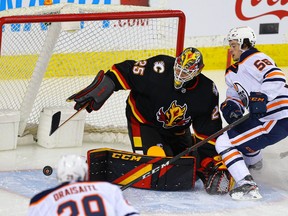 Calgary Flames goalie Jacob Markstrom makes save Kailer Yamamoto of the Edmonton Oilers during NHL hockey in Calgary on Saturday February 6, 2021. Al Charest / Postmedia