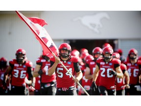 Calgary Stampeders Pierre-Luc Caron runs onto the field during player introductions before facing the Winnipeg Blue Bombers in this photo from September 2016.