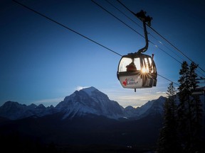 The sun goes down behind the Grizzly Express Gondola at Lake Louise ski resort.