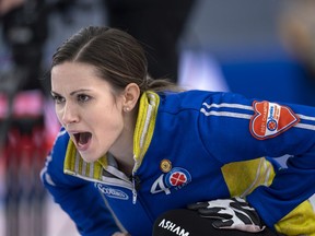 Skip Laura Walker and Team Alberta have locked down a spot in the championship round at the Scotties Tournament of Hearts in Calgary.
