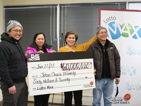 (Left to right) John Chua, Jhoana Chua, Angie Chua, and Ben Lagman pick up their cheque at the Western Canada Lottery Corporation offices in Winnipeg after bringing home a staggering $60 million jackpot on the Jan. 22 Lotto Max draw – the largest lottery win in Manitoba history and the biggest payout ever in Canada from a ticket bought online.