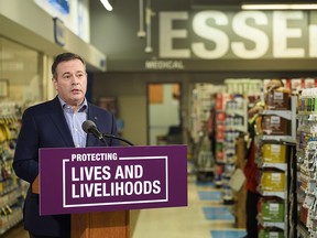 Premier Jason Kenney speaks at a press conference at Crowfoot Co-op in Calgary on Tuesday, March 2, 2021.