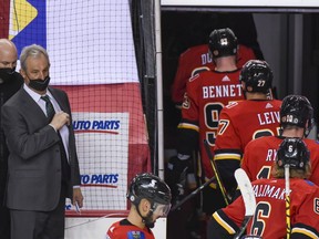 Calgary Flames head coach Darryl Sutter looks on as his team leaves the rink after a 7-3 loss in NHL game against Edmonton Oilers in Scotiabank Saddledome on Wednesday, March 17, 2021. Azin Ghaffari/Postmedia