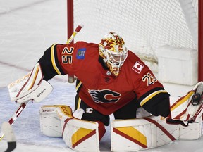 Calgary Flames goalie Jacob Markstrom makes a save during NHL game against Edmonton Oilers at the Scotiabank Saddledome on Wednesday.
