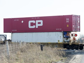 This file photo shows a train pulling transport boxcars near the Canadian Pacific Railway Vaughan Intermodal Terminal, Tuesday November 21, 2017.