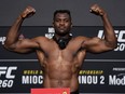 LAS VEGAS, NEVADA - MARCH 26: In this handout photo provided by UFC,  Francis Ngannou of Cameroon poses on the scale during the UFC 260 weigh-in at UFC APEX on March 26, 2021 in Las Vegas, Nevada.