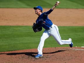 Toronto Blue Jays' Ryan Borucki delivers a pitch during a spring training game.