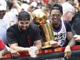 Drake, left, with Toronto Raptors guard Kyle Lowry during the Toronto Raptors Championship Parade June 17, 2019.