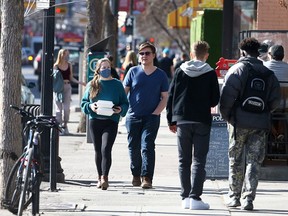 17th Avenue was busy during a warm afternoon in Calgary on Friday, March 12, 2021.