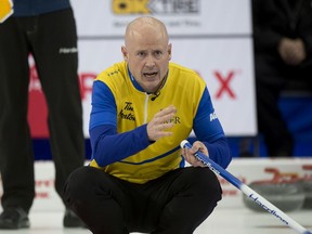 Calgary Ab, Mar5, 2021,WinSport Arena at Canada Olympic Park.Tim Hortons Brier.Team Wild Card is #2 skip Kevin Koe of Calgary Ab, waves his front end into the house  during his opening draw against Nova Scotia. Michael Burns Photo