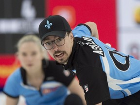 Team Quebec's Laurie St-Georges and playing partner Felix Asselin compete in Draw 5 against Team Ontario.