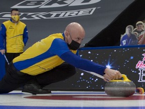 Calgary Ab,March 4, 2021, Tim Horton Brier.Skip Kevin Koe of Calgary team wc 2 delivers his stone during practice day at the Tim Hortons Brier. Michael Burns Photo