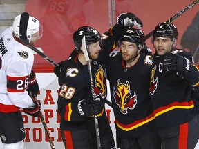 Calgary Flames Dillon Dube scores on Ottawa Senators goalie Joey Daccord in second period action at the Scotiabank Saddledome in Calgary on Thursday, March 4, 2021. Darren Makowichuk/Postmedia