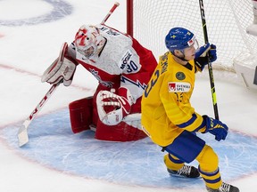 EDMONTON, AB - DECEMBER 26: Emil Heineman #13 of Sweden celebrates a goal against goaltender Nick Malik #30 of the Czech Republic during the 2021 IIHF World Junior Championship at Rogers Place on December 26, 2020 in Edmonton, Canada.