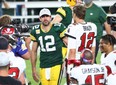 Buccaneers quarterback Tom Brady (right) greets Green Bay Packers quarterback Aaron Rodgers (left) after a NFL game at Raymond James Stadium.