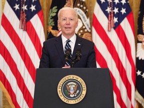 U.S. President Joe Biden answers a question as he holds his first formal news conference as president in the East Room of the White House in Washington, March 25, 2021.