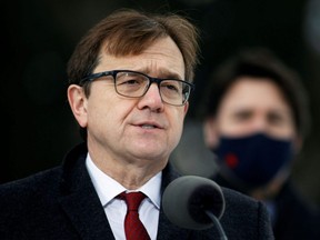 Jonathan Wilkinson, Minister of the Environment and Climate Change, attends a news conference at the Dominion Arboretum in Ottawa, Dec. 11, 2020.