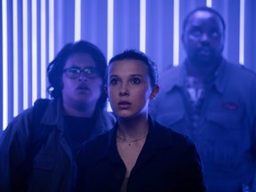 Julian Dennison, Millie Bobby Brown and Brian Tyree Henry in a scene from Godzilla vs. Kong.