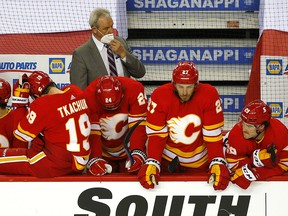 Calgary Flames head coach Darryl Sutter behind the bench in the dying minutes of another loss to the Ottawa Senators on April 19, 2021.