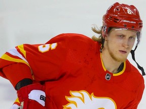 Calgary Flames Juuso Valimaki during warm-up before a game against the Edmonton Oilers in NHL hockey in Calgary on Monday March 15, 2021. Al Charest / Postmedia