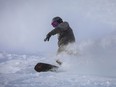 A snowboarder enjoys the excellent conditions in Paradise Bowl at Lake Louise Ski Resort west of Calgary.