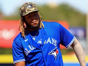 Vladimir Guerrero Jr. #27 of the Toronto Blue Jays looks on during a game against the Philadelphia Phillies at TD Ballpark on May 16, 2021 in Dunedin, Florida.