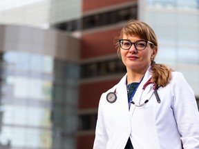 Infectious diseases specialist Dr. Lynora Saxinger poses for a photo outside the Mazankowski Heart Institute at the University of Alberta in Edmonton, on Friday, March 5, 2021.