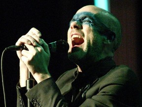 R.E.M. frontman Michael Stipe -- pictured at a 2004 performance in Winnipeg -- worked at writing about the newly-discovered species of ant, Strumigenys ayersthey.