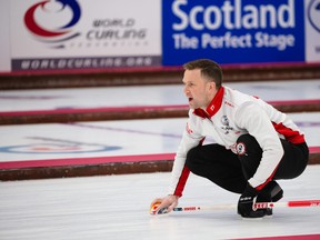 Team Canada's Brad Gushue throws a tock at curling's world mixed doubles tournament in Aberdeen, Scotland.