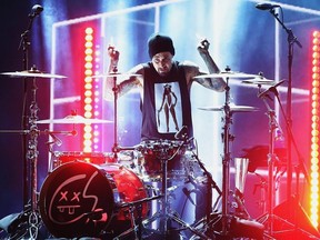 Musician Travis Barker performs onstage during the 2016 American Music Awards at Microsoft Theater on November 20, 2016 in Los Angeles, California.