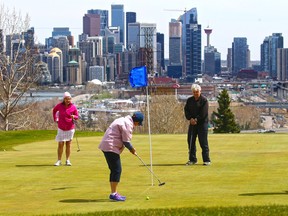 A group of friends enjoy golfing at Shaganappi Point Golf Course on Thursday, May 6, 2021. Starting next week pandemic restrictions will limit tee time bookings to members of the same household or, if living alone, individuals plus their two close contacts.
Gavin Young/Postmedia