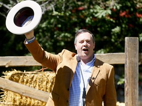 File photo: Then-UCP Leader Jason Kenney talks to supporters during the UCP Stampede BBQ at James Short Park in Calgary on Sunday, July 8, 2018.
