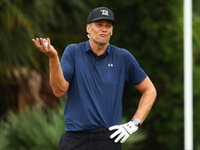 NFL player Tom Brady of the Tampa Bay Buccaneers reacts on the seventh green during The Match: Champions For Charity at Medalist Golf Club on May 24, 2020 in Hobe Sound, Florida.